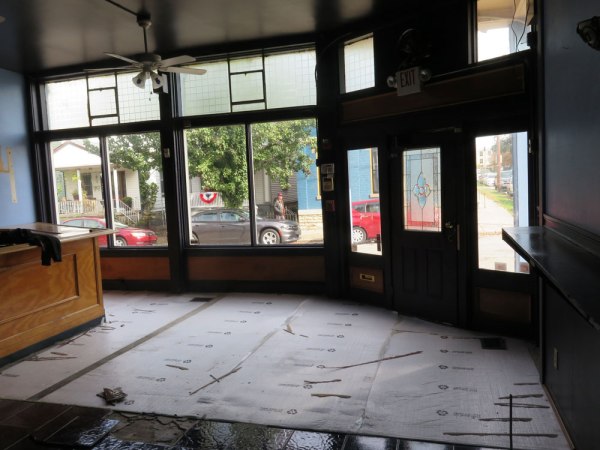 The front flooring of the storefront. Plastic floor – gone. Tile.... ugh.