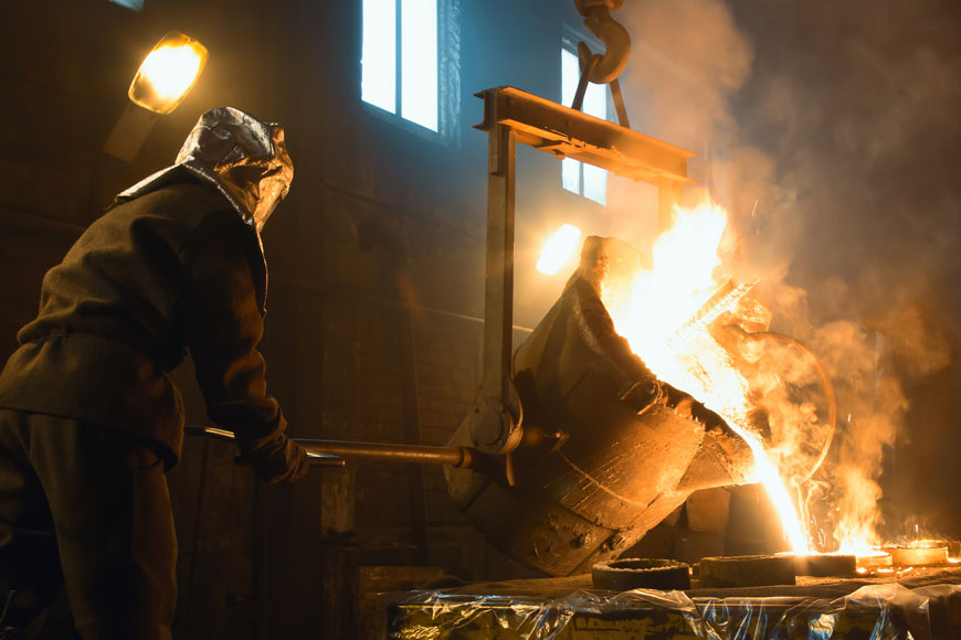 Sample of liquid cast steel is poured with ladle