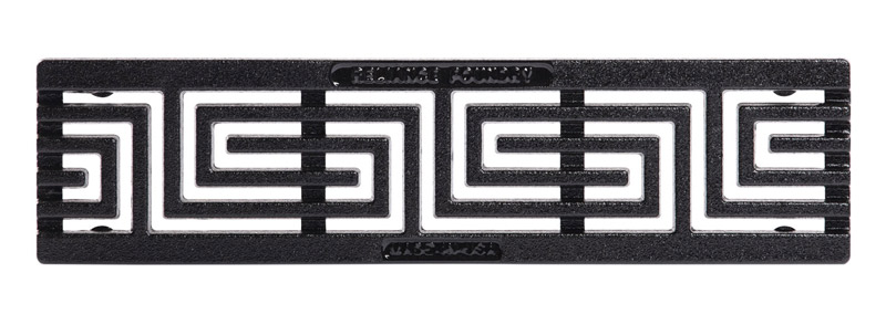 A cast iron 6-inch trench grate with slots in the shape of Greek keys.