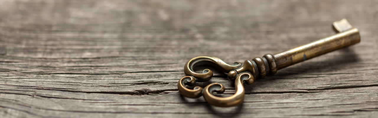 Antique key on the wooden table